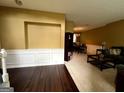 Open living spaces showcasing a combination of carpeted and hardwood floors at 3838 Kirkwood Nw Run, Kennesaw, GA 30144