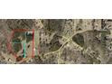 Aerial view showcasing the property's boundaries and surrounding landscape at 1627 Leguin Mill Rd, Locust Grove, GA 30248