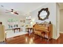 Comfortable living area featuring hardwood floors, lots of natural light, and stylish decor at 1801 Ridgefield Dr, Peachtree City, GA 30269