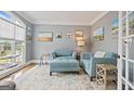 Cozy living room with comfortable seating, natural light, and stylish decor at 6317 Benbrooke Nw Overlook, Acworth, GA 30101