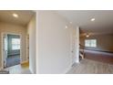 Inviting hallway with views into the living room and adjacent bedroom at 3402 Milan Ct # 1 Plapprox Sqft 2, Douglasville, GA 30135
