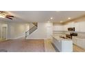 Modern kitchen featuring white cabinets, granite countertops, and stainless steel appliances at 3402 Milan Ct # 1 Plapprox Sqft 2, Douglasville, GA 30135