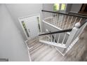 Bright foyer with updated flooring and staircase at 133 Deerfield Ln, Carrollton, GA 30116