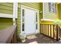 Inviting front entrance with white door and sidelights at 133 Deerfield Ln, Carrollton, GA 30116