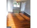 Bright living room with hardwood floors and lots of natural light at 5243 Eubanks Dr, Lake City, GA 30260