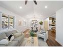 Bright living room with hardwood floors, vaulted ceilings, and modern furnishings at 2541 Peyton Woods Sw Trl, Atlanta, GA 30311