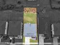 Aerial view of a home showcasing the roof, backyard, and surrounding neighborhood at 168 Warbler Way, Mcdonough, GA 30253