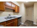 Functional kitchen with stainless steel dishwasher and double-basin sink at 2986 Parc Lorraine, Lithonia, GA 30038