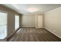 Neutral bedroom with carpet and natural light from two windows at 4313 Executive Dr, Stone Mountain, GA 30083
