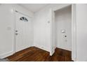 Bright foyer with hardwood floors and a convenient coat closet at 2584 Oldknow Nw Dr, Atlanta, GA 30318