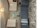 Modern kitchen featuring stainless steel appliances and elegant marble backsplash at 2953 Meadowview Se Dr, Atlanta, GA 30316