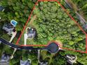 Aerial view of property showing lot size, landscaping, and surrounding neighborhood at 240 Longmead Dr, Fayetteville, GA 30215