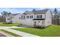 Beautiful two-story home with well-manicured lawn at 1950 Van Allen Ct, Dacula, GA 30019