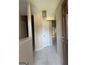Inviting entryway with neutral paint and a tile floor, leading to other rooms in the house at 6050 Great Oaks Dr, Lithonia, GA 30058
