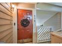 Inviting front door entrance with a wreath, sidelight, and clear address numbers at 578 Mcgill Ne Pl # 578, Atlanta, GA 30312