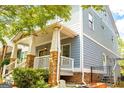 Charming home exterior with a welcoming front porch and craftsman architectural details at 625 Chestnut St # D, Hapeville, GA 30354