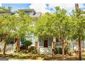 Beautiful home featuring a covered porch, stone accents, and lush landscaping at 625 Chestnut St # D, Hapeville, GA 30354