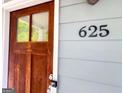 Close up view of house number 625 on a light blue home at 625 Chestnut St # D, Hapeville, GA 30354