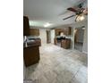 Bright kitchen with tile floors, stainless steel appliances, and ample cabinet space at 686 Favorwood Sw Dr, Marietta, GA 30060