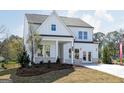 Attractive two-story new construction home with a covered porch, craftsman features and professional landscaping at 602 Belshire Dr, Acworth, GA 30102