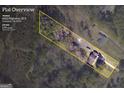 Aerial view of a home on a 1.91-acre lot at 6023 Highway 20 S Covington, GA 30016 at 6023 Highway 20 S, Covington, GA 30016