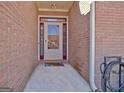 Close-up of front door with sidelights offering an inviting entrance at 170 Habersham Dr, Fayetteville, GA 30214