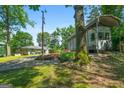 Long driveway leading to the home and garage with an camper parked on the side at 312 Flat Shoals Church Rd, Stockbridge, GA 30281