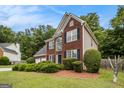 Charming brick front home with mature landscaping at 5409 Trumpet Vine Se Trl, Mableton, GA 30126