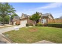 A well kept brick house with a manicured front lawn, showcasing neighborhood charm at 3206 Abbott Dr # 12, Powder Springs, GA 30127
