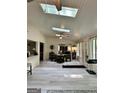 Bright sunroom with skylights, a ceiling fan, and dining area at 4786 Carlene Sw Way # Iv, Lilburn, GA 30047
