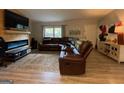 Comfortable living room with a large sectional sofa and a stylish area rug at 324 Bells Ferry Ne Rd, White, GA 30184