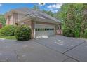 Spacious two-car garage adjacent to a driveway, offering convenient parking and storage options at 2795 Hawthorne Dr, Atlanta, GA 30345