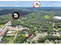 Aerial view of the property nestled in a lush, green neighborhood at 422 Old Ivy Path, Mcdonough, GA 30253