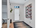 Bright hallway with modern decor and wood floors at 3587 Candler Ct, Hapeville, GA 30354