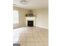 Inviting living room with tile flooring, fireplace and decor for a warm atmosphere at 2517 Walter Way, Stockbridge, GA 30281