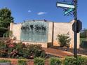 Community entrance featuring the Eagle's Landing monument sign and landscaping at 116 Royal Burgess Way, Mcdonough, GA 30253
