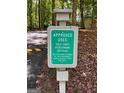 Sign with approved uses for golf carts, pedestrians and bicycles at 335 Cedar Ln, Fayetteville, GA 30214