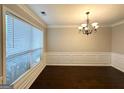 Spacious living room featuring large windows and beautiful hardwood flooring, perfect for entertaining at 3814 Clear Lake Nw Way, Acworth, GA 30101