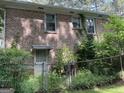 Backyard with privacy fence and brick exterior at 4116 Warrior Trl, Stone Mountain, GA 30083