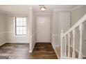 Inviting entryway boasts new flooring, fresh paint, and convenient access to the upper level at 5461 Park S Pl, Atlanta, GA 30349