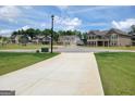 Neighborhood street featuring multiple well-kept homes, offering a glimpse into a Gathering-friendly community at 436 Lothbury Ave, Locust Grove, GA 30248