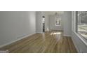 Bright living room with hardwood floors, fresh paint and lots of natural light at 1684 Lake Harbin Rd, Morrow, GA 30260
