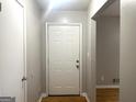 Bright entryway with hardwood floors and neutral paint at 2820 Lloyd Rd, Decatur, GA 30034