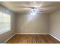 Spacious living room with hardwood floors and ample natural light at 2820 Lloyd Rd, Decatur, GA 30034