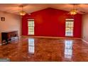 Spacious living room featuring glossy tile flooring and large windows for natural light at 5700 Miles Rd, South Fulton, GA 30349