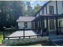 Lovely home featuring an expansive deck with railing at 172 Oak Forest Se Dr, Smyrna, GA 30082