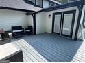 Spacious deck with seating, perfect for outdoor entertaining at 172 Oak Forest Se Dr, Smyrna, GA 30082