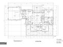 An overview of the 1st floor plan, showcasing the layout of the kitchen, living room, bedrooms, and garage at 253 E Crestwood Rd, Tyrone, GA 30290