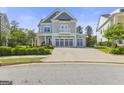Beautiful two-story home with a three-car garage, balcony, and a spacious driveway at 229 Widener Way, Peachtree City, GA 30269