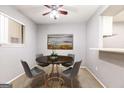Cozy dining area with modern lighting and decor, perfect for intimate gatherings at 1818 Huntingdon Chase, Atlanta, GA 30350